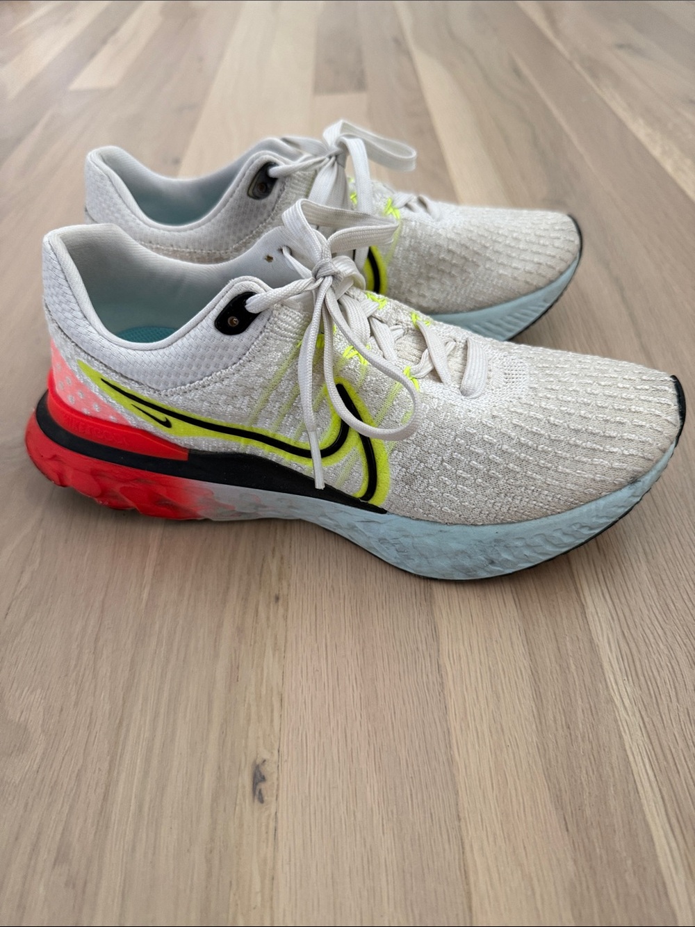 Women’s Nike White Sneakers with Neon Yellow, blue and Coral Accents